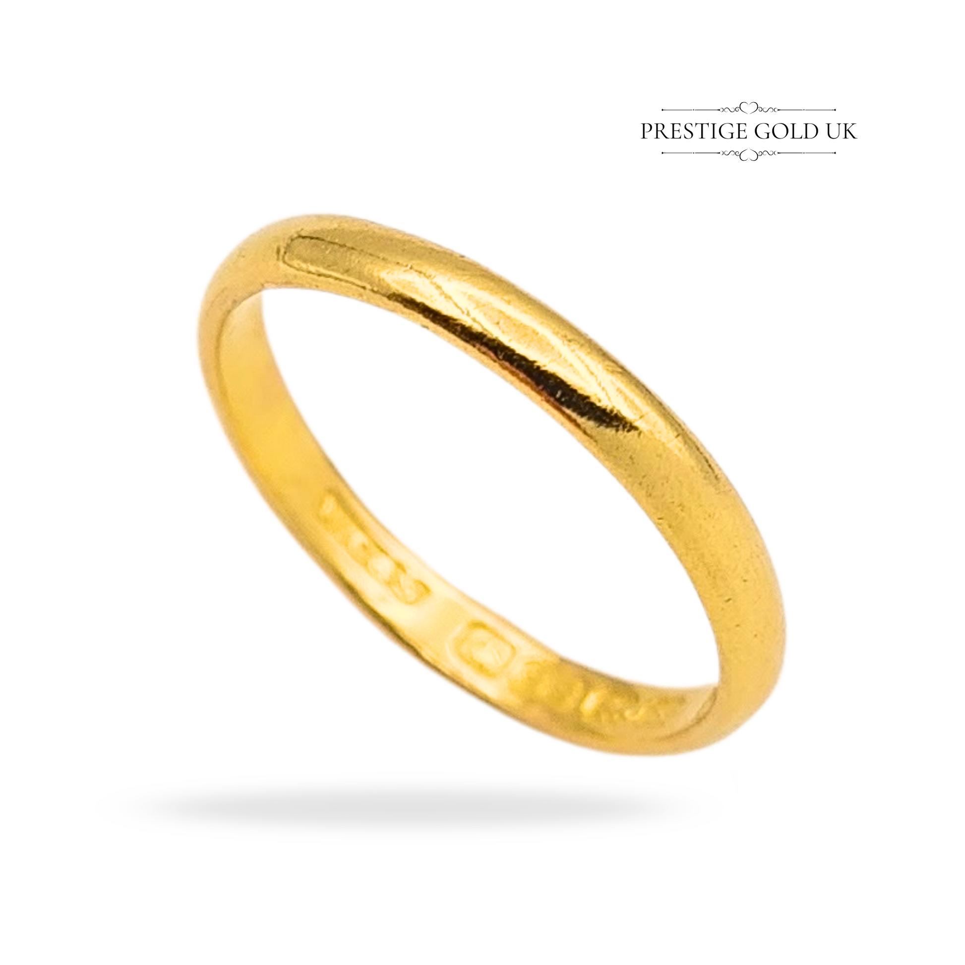 22ct gold wedding band, fully hallmarked Birmingham 1934, UK size J / US 5 1/4, weighing 1.9g and 4mm wide. Classic vintage ring with solid weight and smooth polished finish, ideal as a wedding, stacking, or heirloom piece.