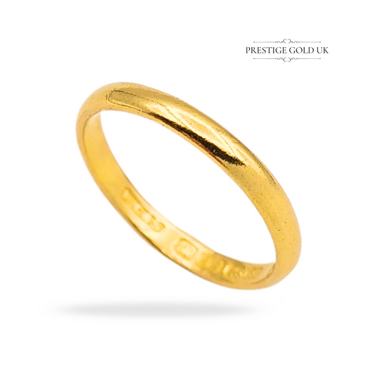 22ct gold wedding band, fully hallmarked Birmingham 1934, UK size J / US 5 1/4, weighing 1.9g and 4mm wide. Classic vintage ring with solid weight and smooth polished finish, ideal as a wedding, stacking, or heirloom piece.
