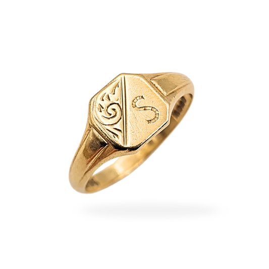 Vintage 9ct gold signet ring engraved with the letter S, hallmarked Birmingham 1975. Small square face measuring 7 × 7mm, UK size L 1/2 US 6, weighing 1.87g. Warm yellow gold with light wear, photographed from multiple angles to show engraving and condition.