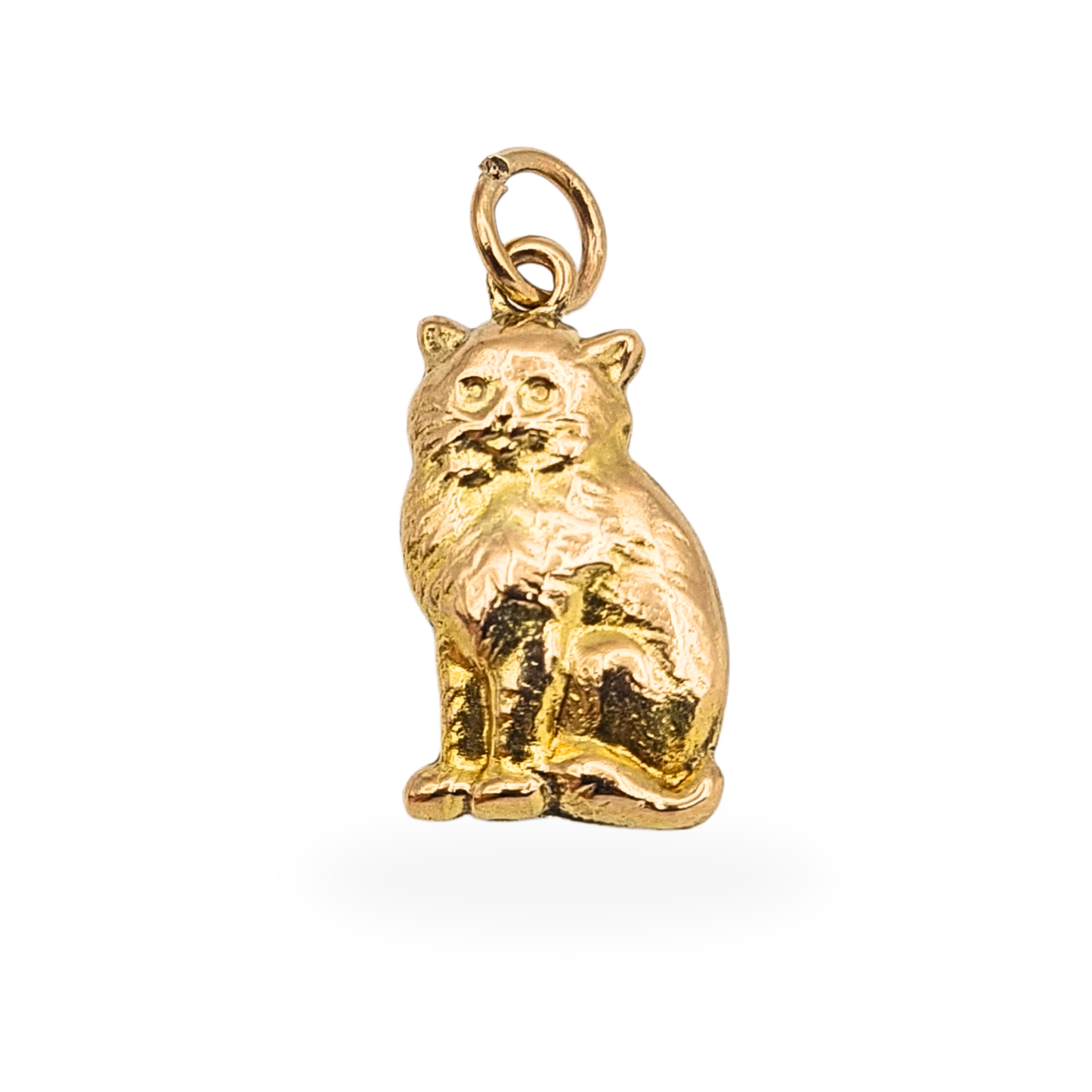 Small 9ct yellow gold puffy cat charm with seated feline design and textured fur detail, hollow construction measuring approximately 18mm tall and weighing 0.8g, stamped 9ct and fully tested, cute gold animal charm ideal for charm bracelet or necklac
