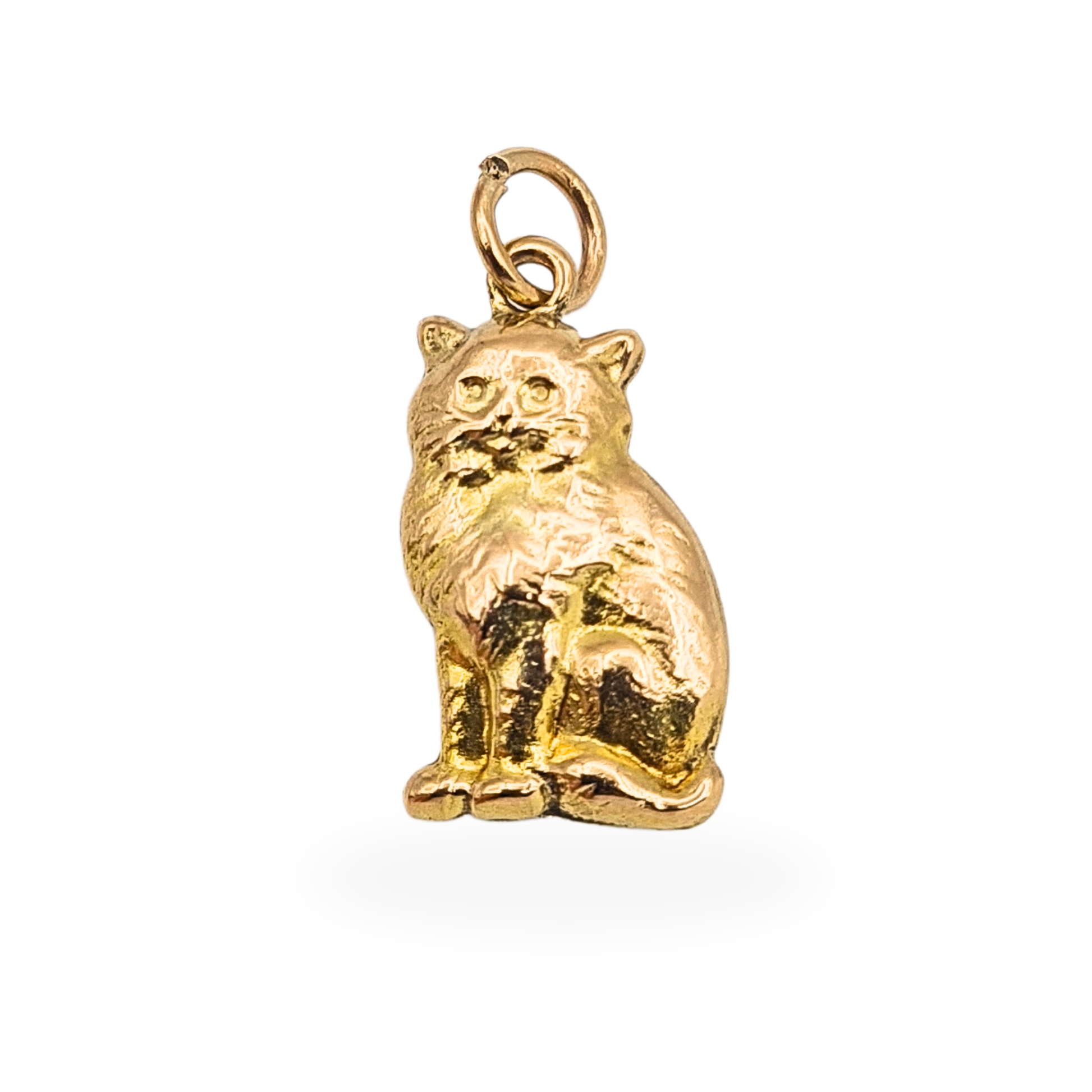 Small 9ct yellow gold puffy cat charm with seated feline design and textured fur detail, hollow construction measuring approximately 18mm tall and weighing 0.8g, stamped 9ct and fully tested, cute gold animal charm ideal for charm bracelet or necklac
