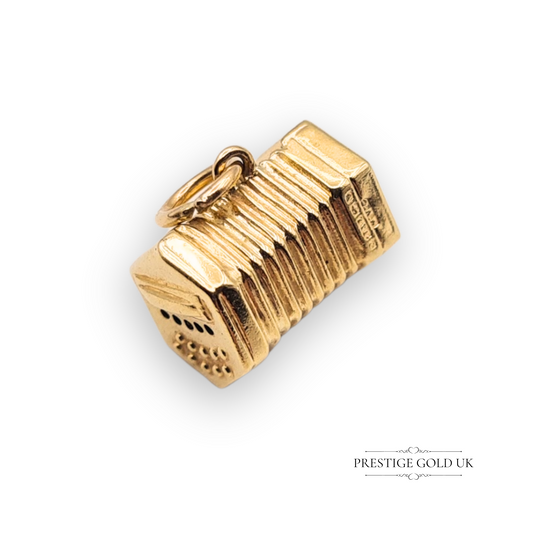 Vintage 9ct gold accordion charm from 1965, featuring a detailed musical instrument design with Birmingham hallmark; small-scale 12mm charm ideal for collectors and music lovers.
