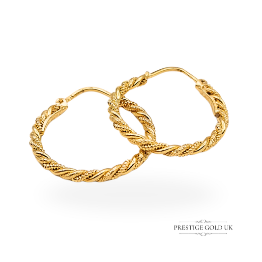 9ct gold rope twist hoop earrings, fully hallmarked Sheffield 1994. Ornate textured design with hinged flip-top fasteners, 14mm diameter, solid 2.17g weight. Warm yellow gold finish, vintage style, excellent condition, secure and elegant.