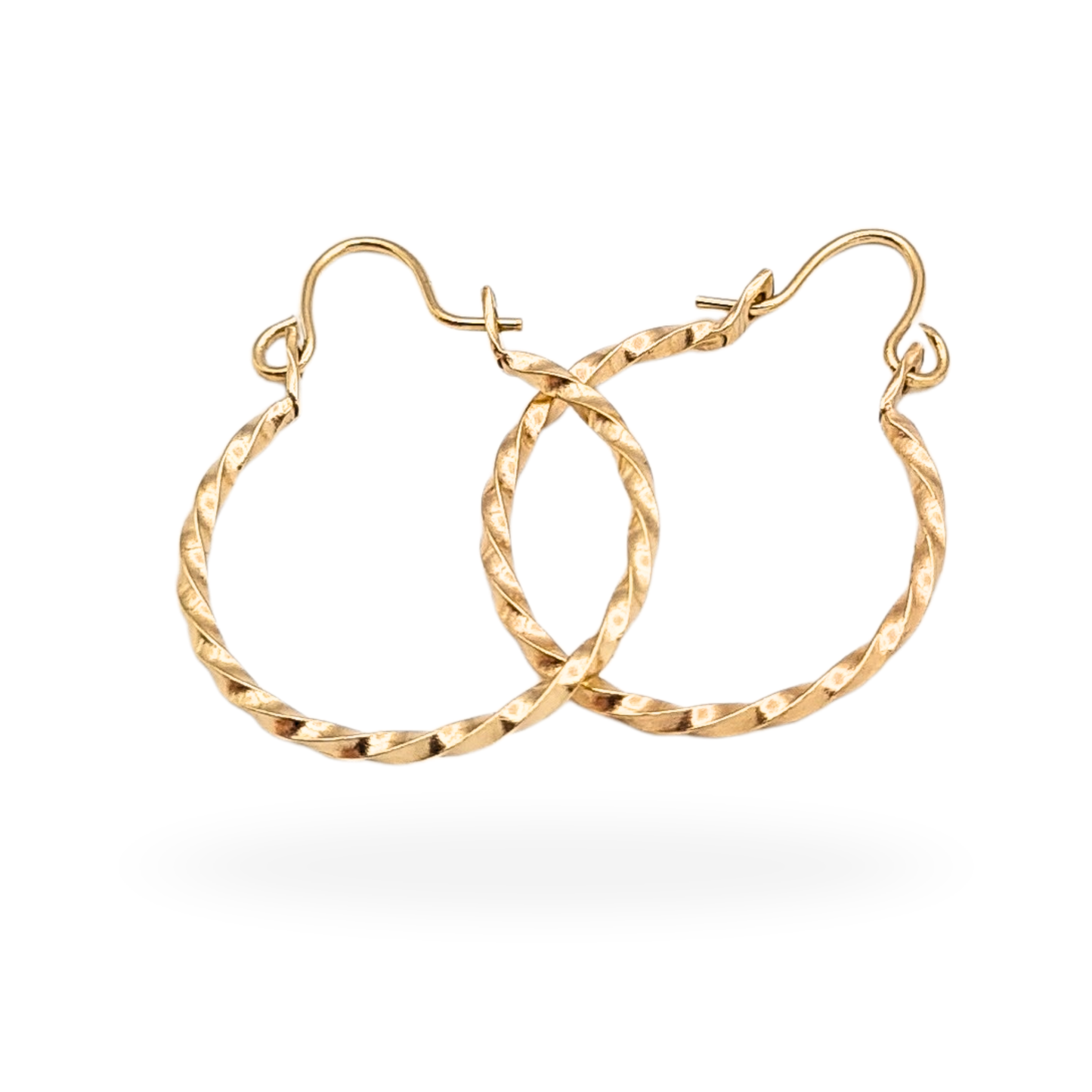 Small 9ct gold twisted hoop earrings, 16mm diameter, solid gold fully tested pair with elegant lightweight design, classic everyday hoops with hook fastenings and bright polished finish, photographed on model and box display.


