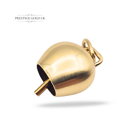 Solid 9ct yellow gold Austrian cow bell charm pendant weighing 1.76 grams, measuring 13mm x 12mm x 9mm, fully tested gold, vintage style with ringing bell feature, polished finish, unmarked but tested.