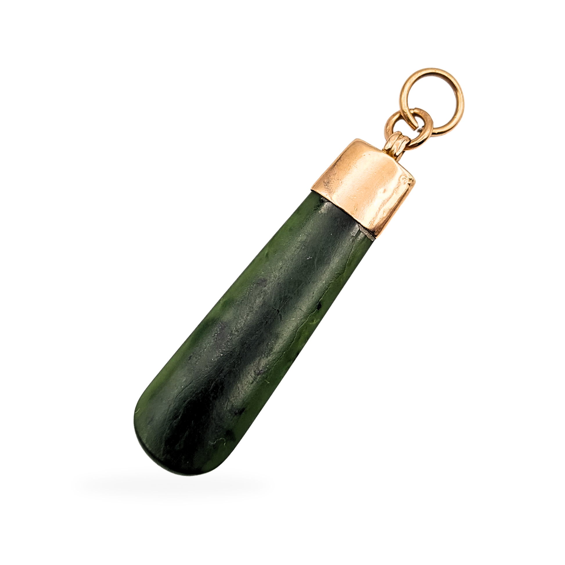 9ct rose gold and nephrite jade pendant featuring a smooth green teardrop-shaped stone capped in tested 375 gold, measuring 50mm long and 13mm wide. A vintage jade drop charm with warm gold fittings, photographed on chain and ruler for scale.