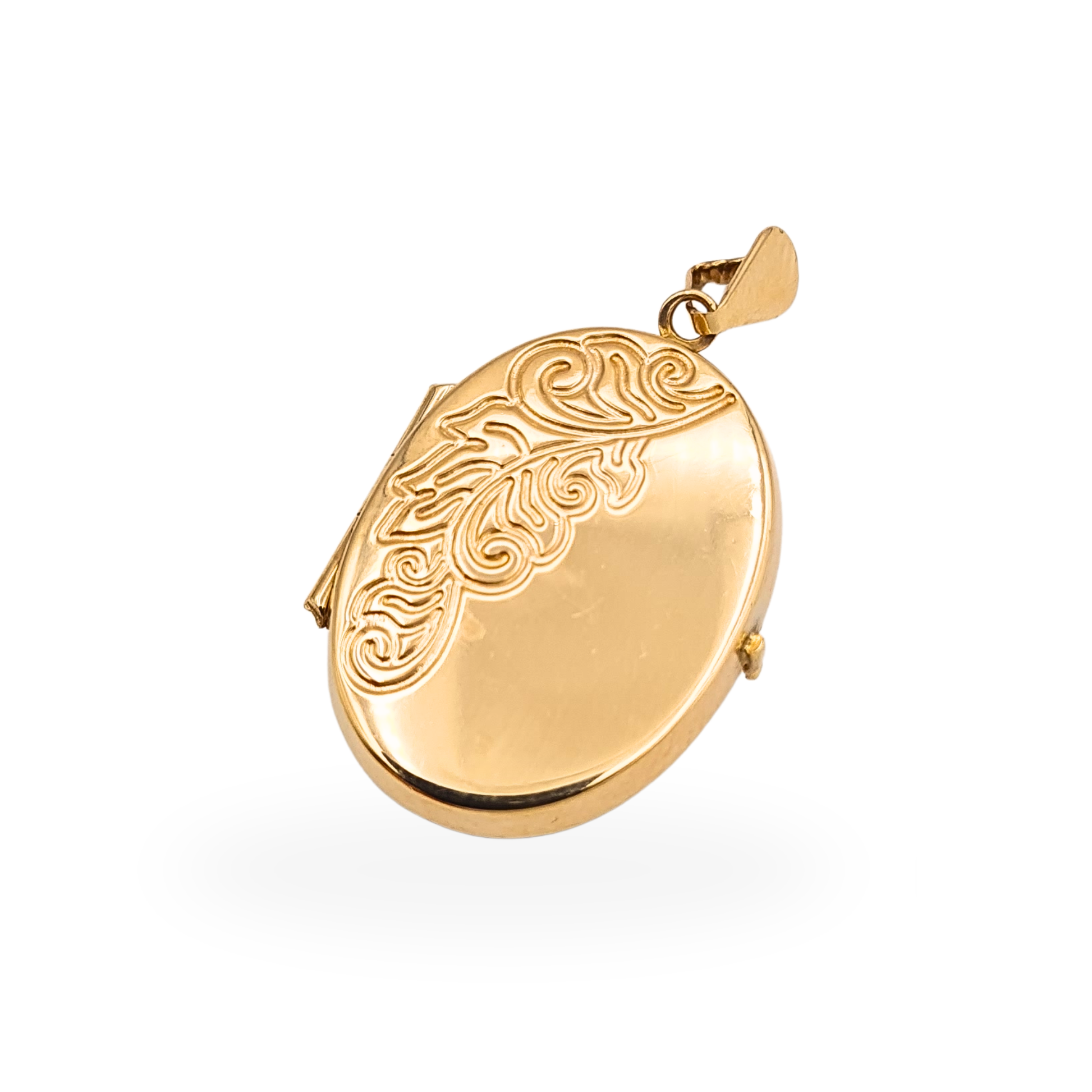 9ct yellow gold engraved oval photo locket pendant with Birmingham 1991 hallmark and opening double photo compartment.