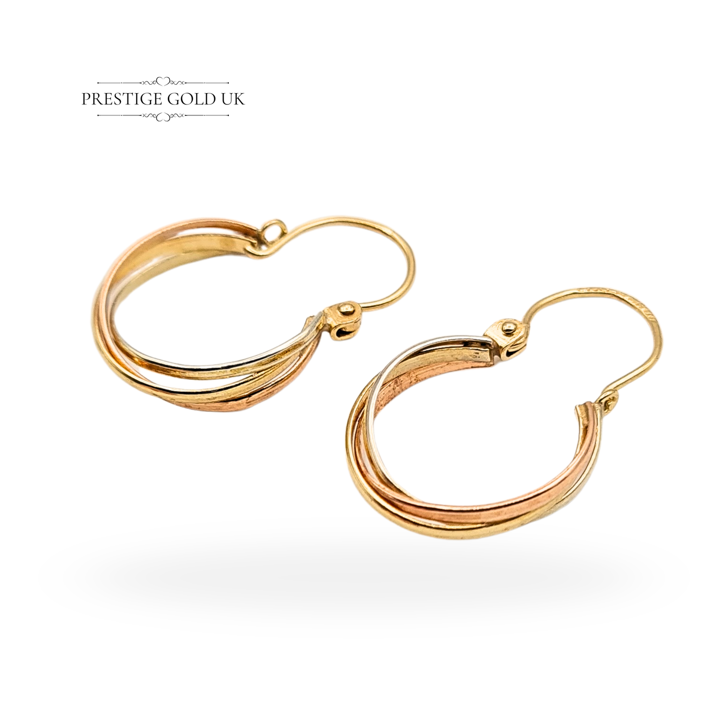 9ct tri-colour gold hoop earrings featuring white, yellow, and rose gold strands, fully hallmarked London 1981. Lightweight 22mm x 14mm vintage hoops with leverback closure, elegant layered design and polished finish. Excellent vintage condition.