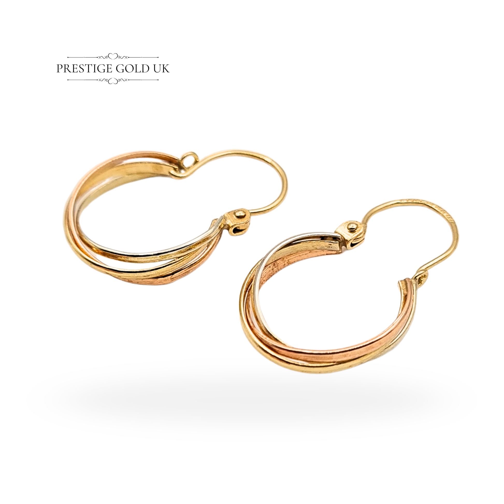 9ct tri-colour gold hoop earrings featuring white, yellow, and rose gold strands, fully hallmarked London 1981. Lightweight 22mm x 14mm vintage hoops with leverback closure, elegant layered design and polished finish. Excellent vintage condition.