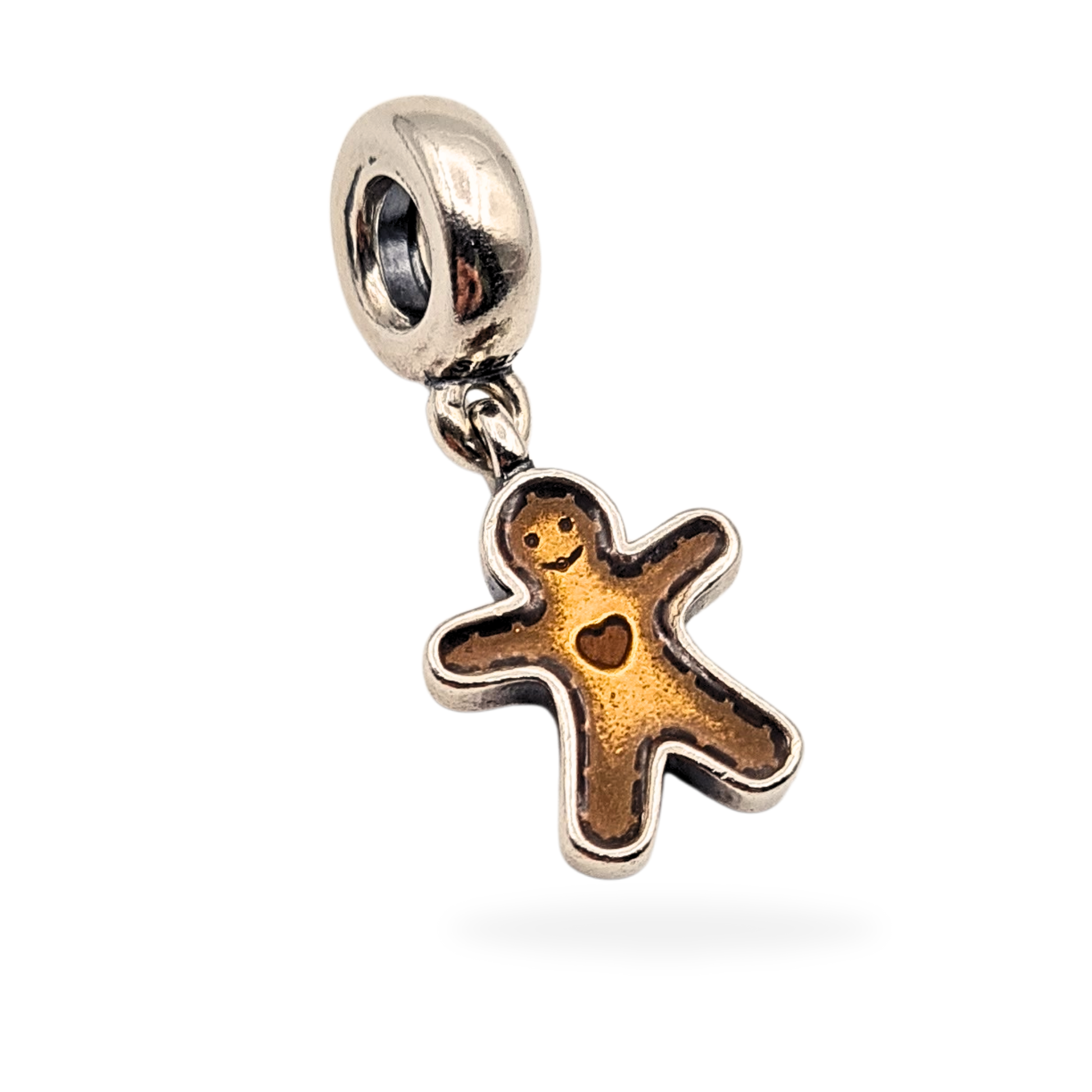 Genuine Pandora Gingerbread Man dangle charm in sterling silver with brown enamel detailing and heart accent. Hallmarked S925 ALE, measures 15mm by 10mm, fits Pandora-style bracelets, excellent condition festive charm.