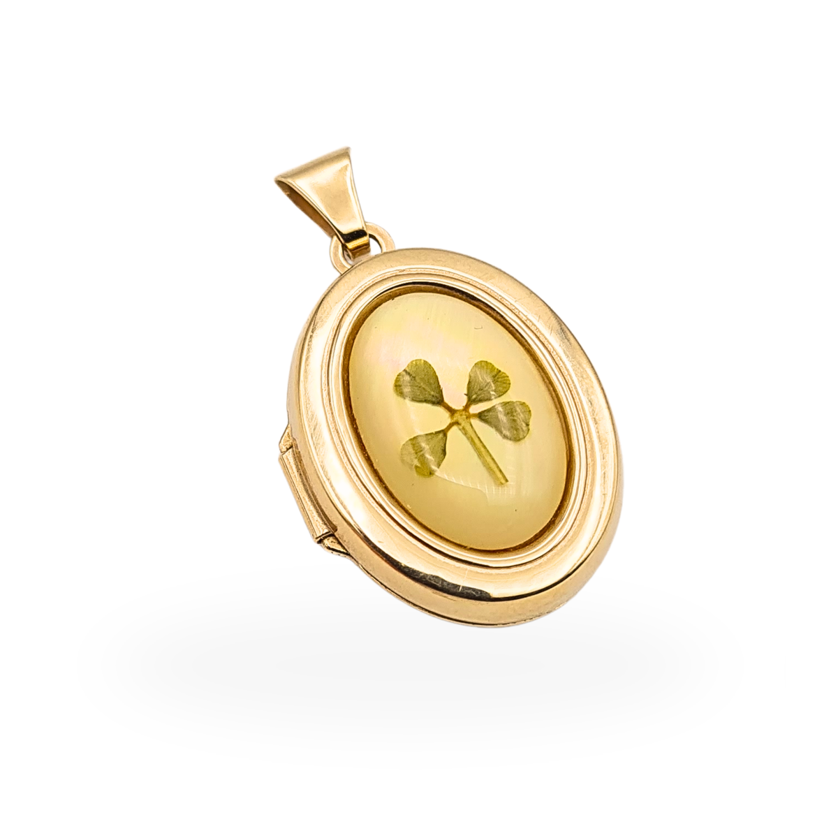 9ct gold oval opening locket with four leaf clover design, fully British hallmarked, 23mm tall