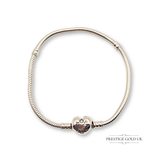Authentic Pandora Moments sterling silver snake chain bracelet with heart-shaped clasp, stamped ALE 925. Measures 7.5 inches (19.5 cm) and weighs 15.84 g, a genuine Pandora piece professionally cleaned for brilliance.