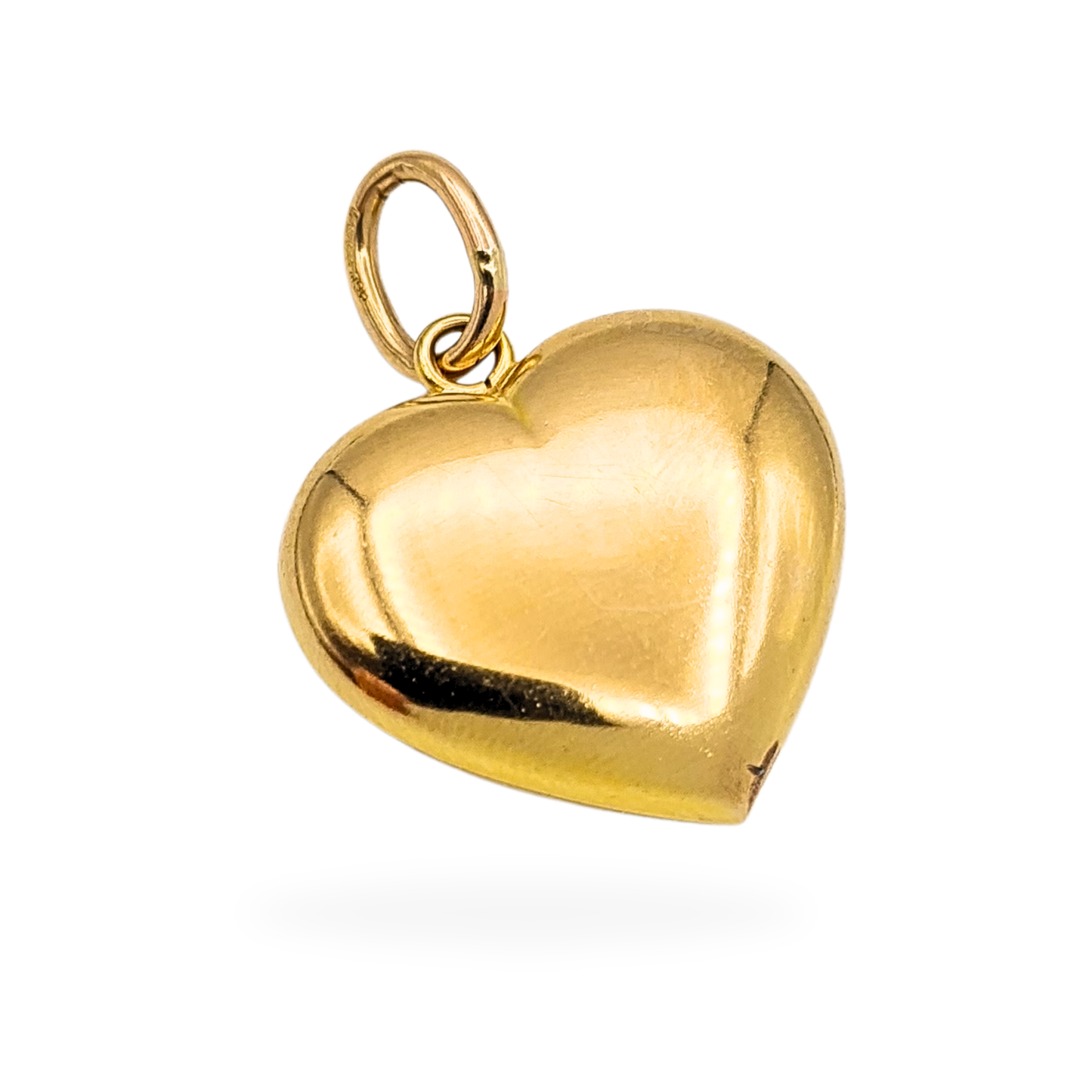 Vintage 9ct yellow gold puff heart pendant, fully hallmarked, 21mm tall by 21mm wide. Features a smooth domed shape with a large jump ring and hollow construction. Weight 1.81g. A romantic and timeless gold charm.
