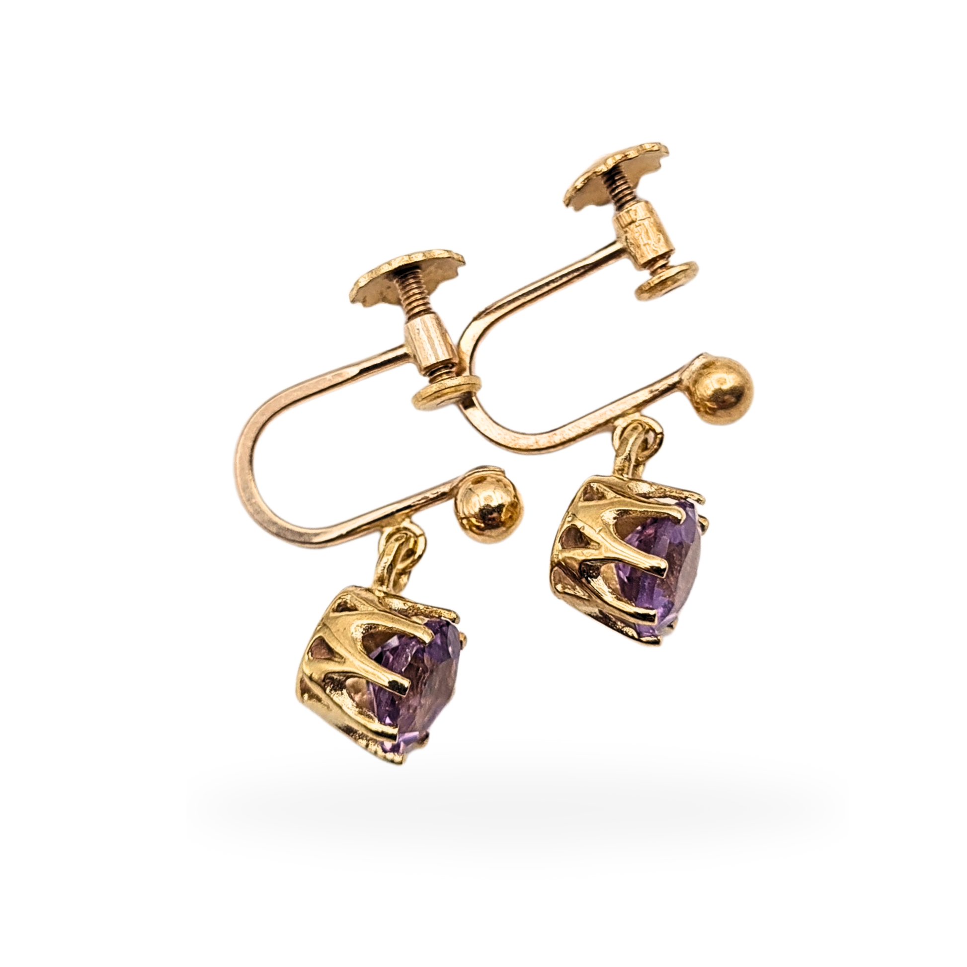 Pair of 9ct yellow gold amethyst drop earrings featuring round cut 6mm purple amethysts in claw settings, fully hallmarked and tested, with secure screw back fittings and a 16mm drop length, shown in very good vintage condition.