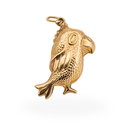 Vintage 9ct gold puffy parrot charm with Birmingham 1982 hallmark and textured feather detail.