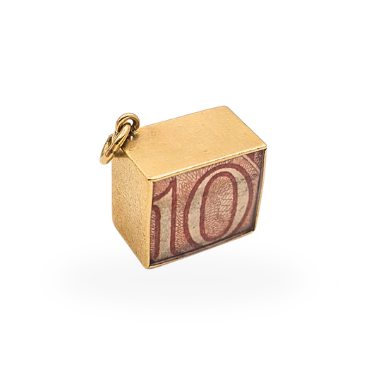 Vintage 9ct gold folded 10 shilling note charm in gold case engraved "In Emergency Break Glass", London 1980.