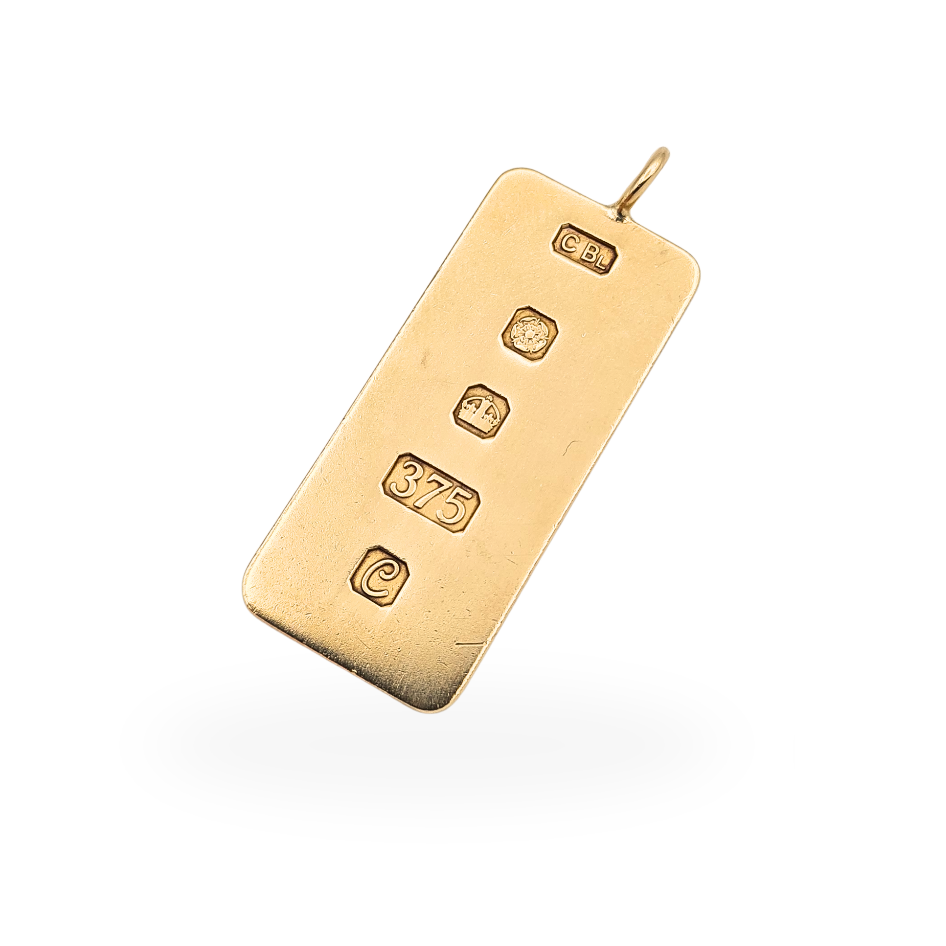 Vintage 9ct gold ingot pendant weighing 9.01g with Sheffield 1977 British hallmarks and polished finish.