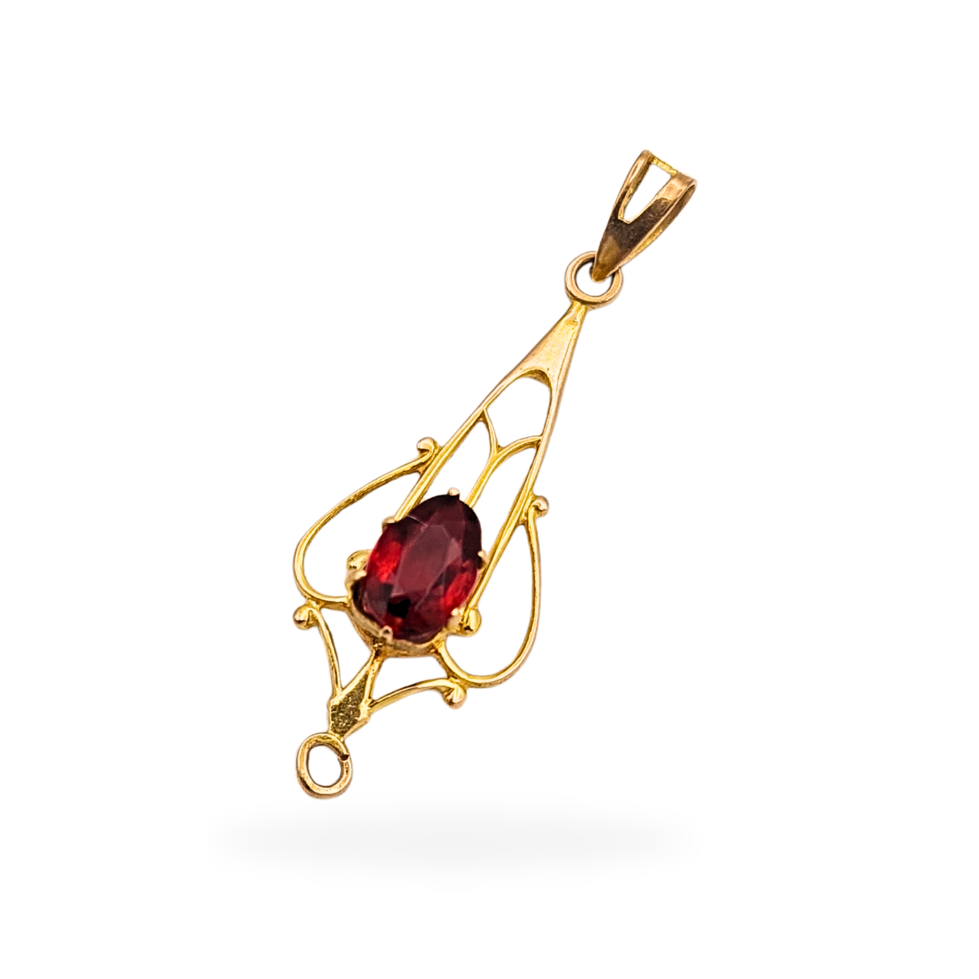 Delicate 9ct gold ruby lavalier pendant with openwork frame, set with an oval deep red ruby. Measuring 25mm tall, 10mm wide and 4mm deep, stamped and tested 9ct gold. Lightweight antique-inspired gold drop pendant in very good condition.
