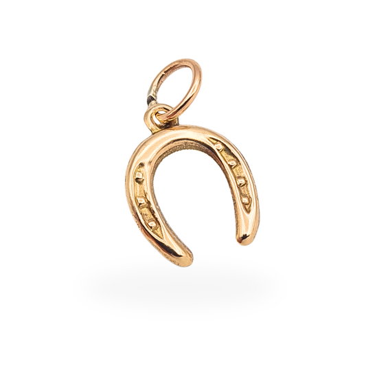 Small 9ct gold horseshoe charm pendant with polished hollow-built design