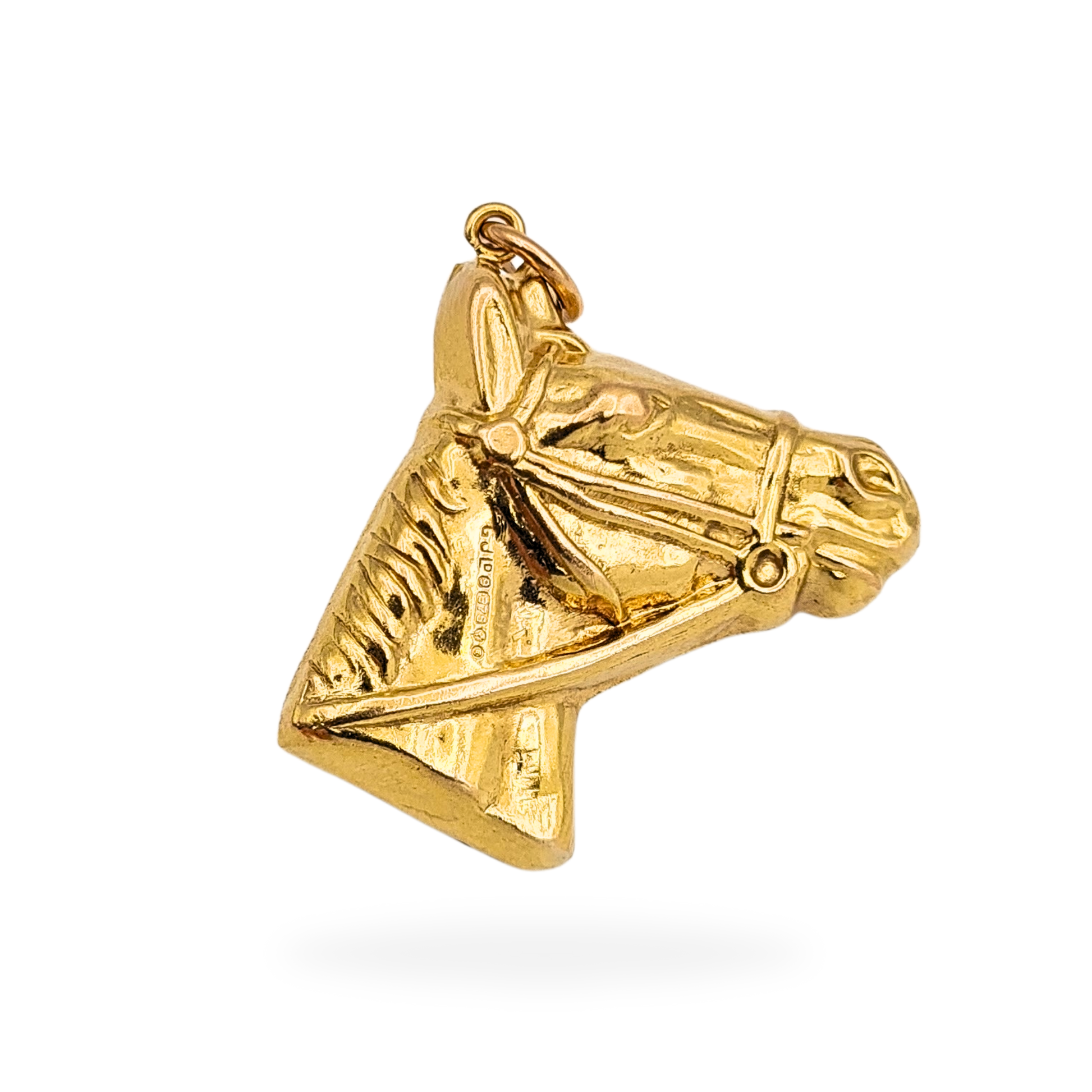 1971 London hallmarked 9ct gold horse head pendant, 25mm tall and 24mm deep, crafted in hollow puffy gold with detailed bridle and mane, weighing 3.4g, a vintage equestrian design with warm polish and three-dimensional sculptural form.