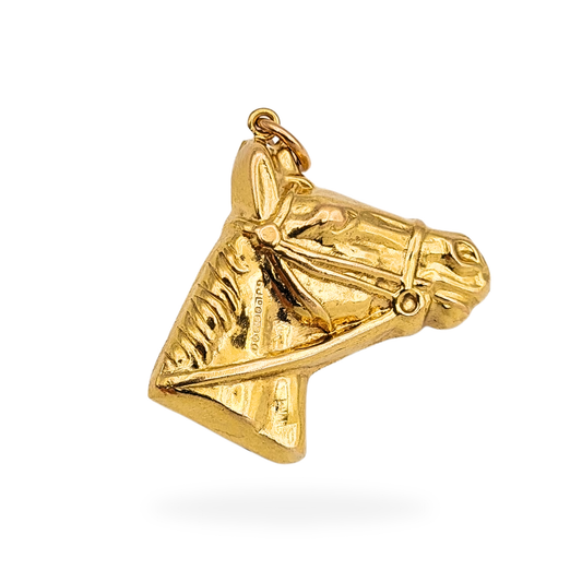 1971 London hallmarked 9ct gold horse head pendant, 25mm tall and 24mm deep, crafted in hollow puffy gold with detailed bridle and mane, weighing 3.4g, a vintage equestrian design with warm polish and three-dimensional sculptural form.