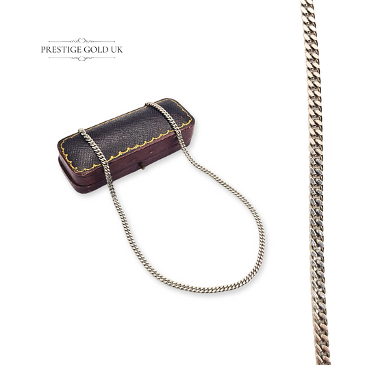 Vintage 925 sterling silver curb chain necklace, hallmarked, measuring 16 inches (41 cm) long and 3 mm wide, weighing 11.21 g. Classic unisex design with a polished finish and secure clasp, ideal for everyday wear or layering.
