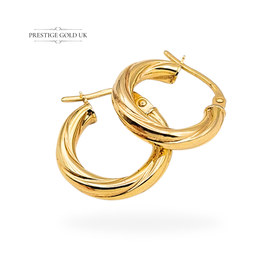 Vintage 9ct yellow gold twist hoop earrings with secure flip-top fasteners, fully hallmarked and polished to a bright finish. Each measures 15mm in diameter and 3mm wide, weighing 1.15g — elegant lightweight hoops ideal for daily wear or gifting.