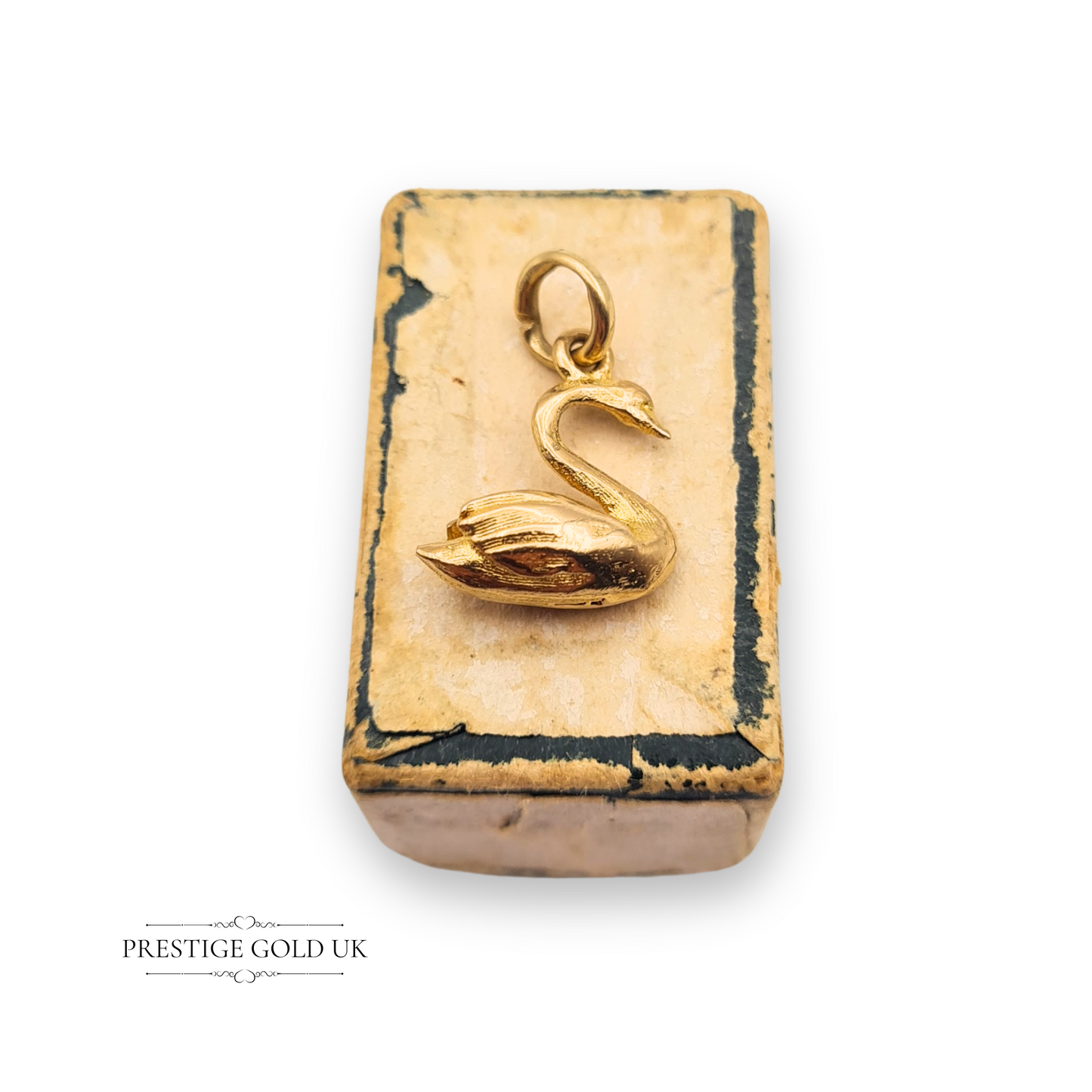 Delicate 9ct yellow gold swan charm, hallmarked Birmingham, 17mm x 11mm, hollow construction, ideal for animal-themed vintage jewellery collections or graceful charm bracelets.