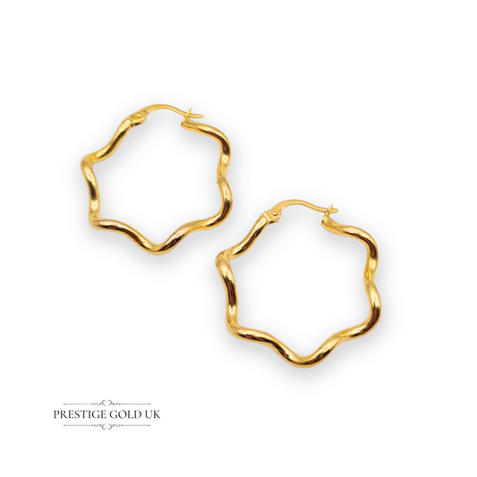 Pair of 9ct gold wavy hoop earrings with flowing sculptural design, 28mm by 26mm, stamped 375 Italy, lightweight and bold with flip-top clasp.