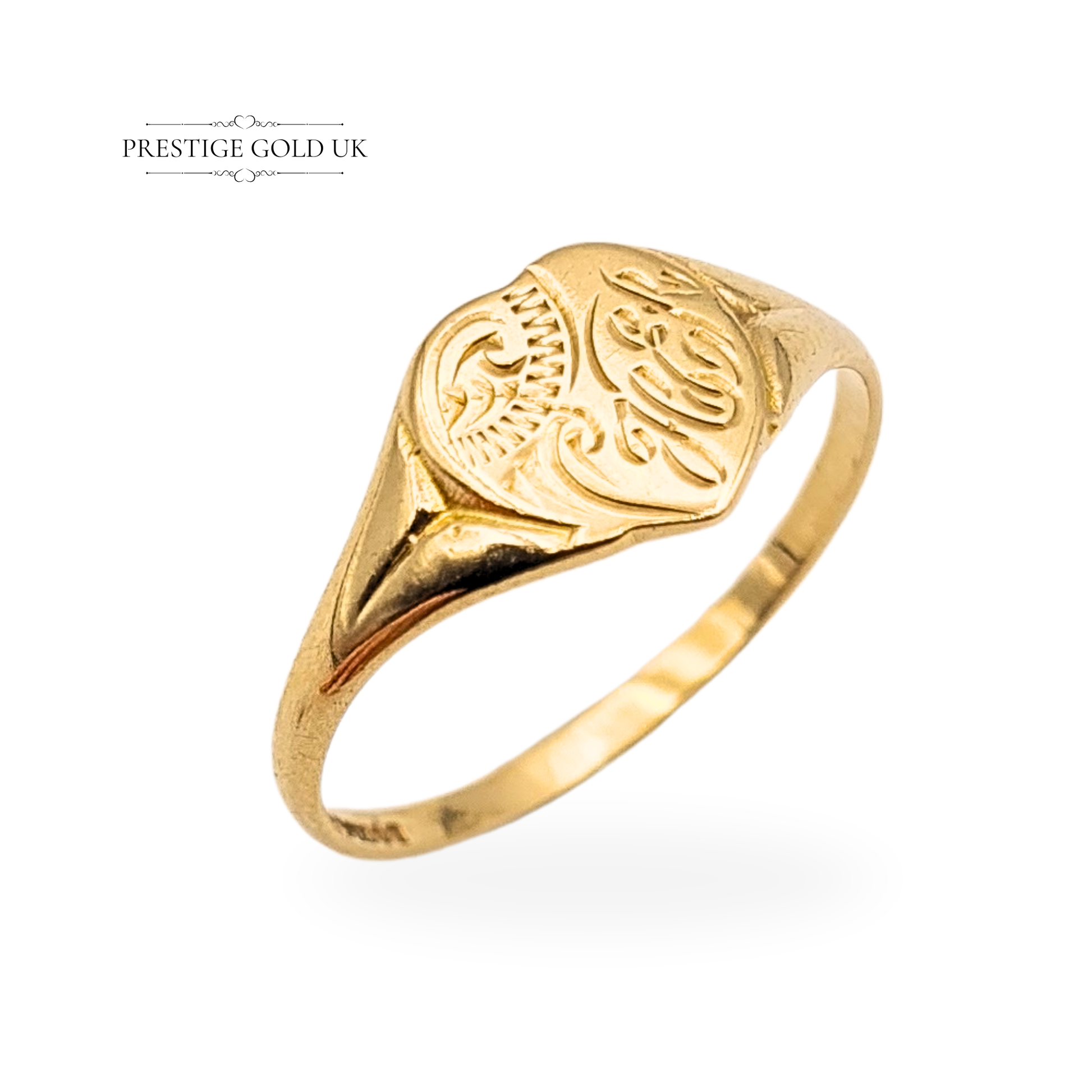 Vintage 9ct gold heart signet ring hallmarked in Birmingham, featuring ornate engraved detailing across the face, UK ring size P / US 7.5, lightweight 1.3g design in yellow gold, beautifully finished with romantic antique character and fine craftsmanship.