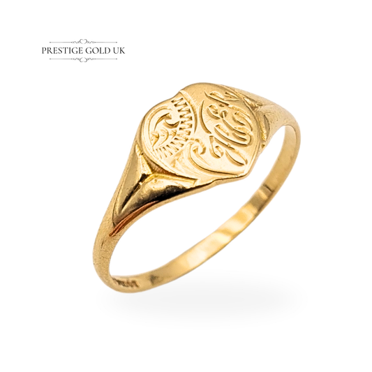Vintage 9ct gold heart signet ring hallmarked in Birmingham, featuring ornate engraved detailing across the face, UK ring size P / US 7.5, lightweight 1.3g design in yellow gold, beautifully finished with romantic antique character and fine craftsmanship.