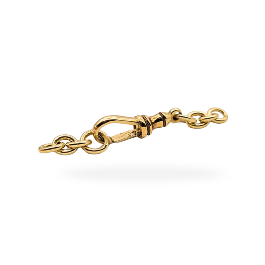 Vintage 9ct yellow gold Albert chain dog clip with original hallmarked links, fully marked Sheffield 1996. Solid gold clip measuring 50mm long with a 22mm dog clip fitting, weighing 2.9g, showing light age wear consistent with careful vintage use.
