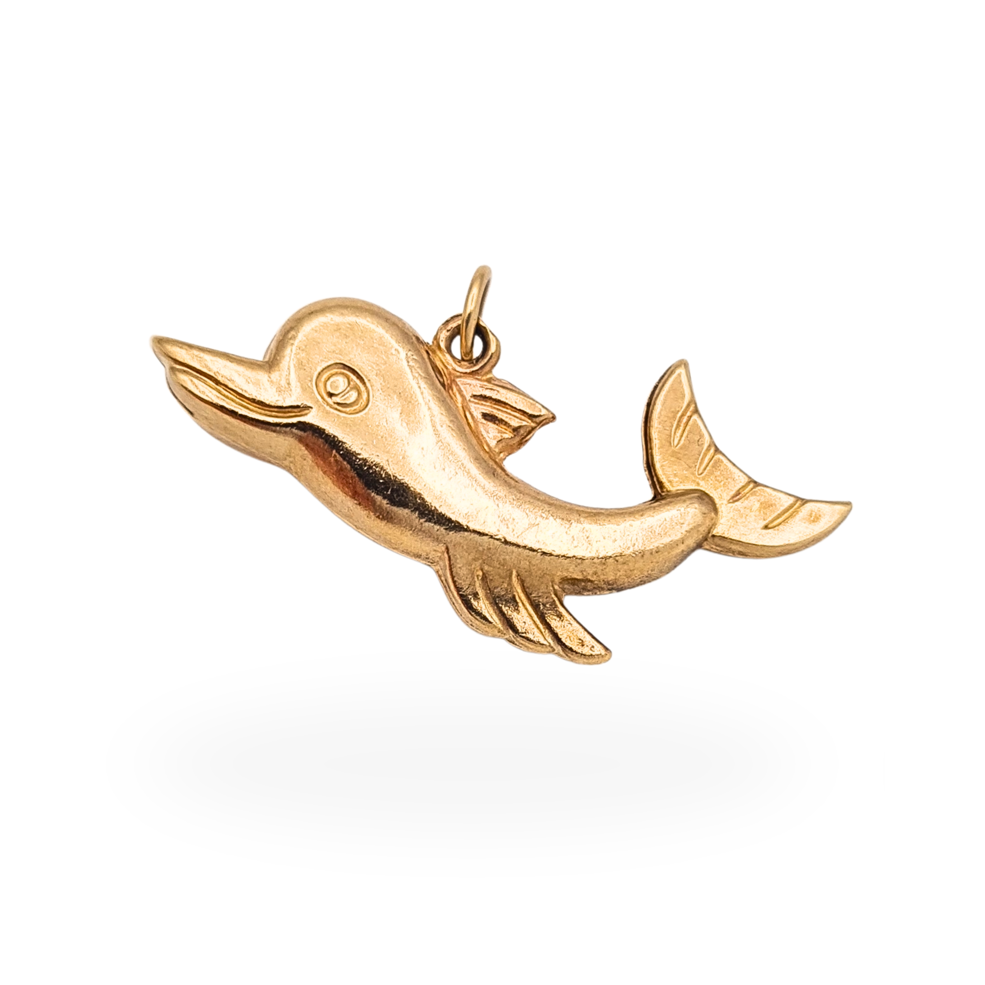 Vintage 9ct gold puffy dolphin charm pendant with full British hallmarks measuring 30mm long.