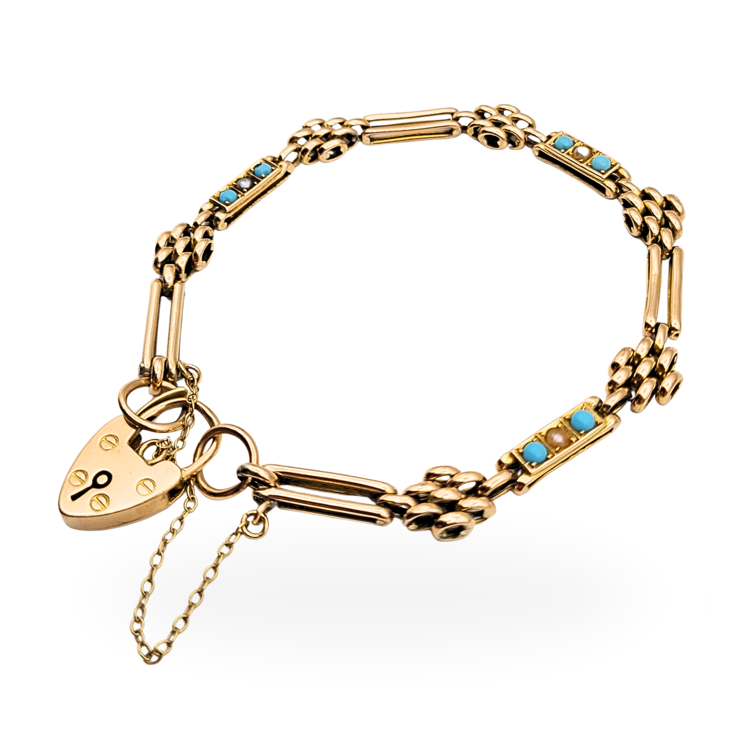 Antique 9ct rose gold turquoise and seed pearl gate bracelet, Birmingham 1904 hallmark, featuring a heart padlock clasp and safety chain, 7½ inches long and 12mm wide, beautifully detailed Edwardian design.