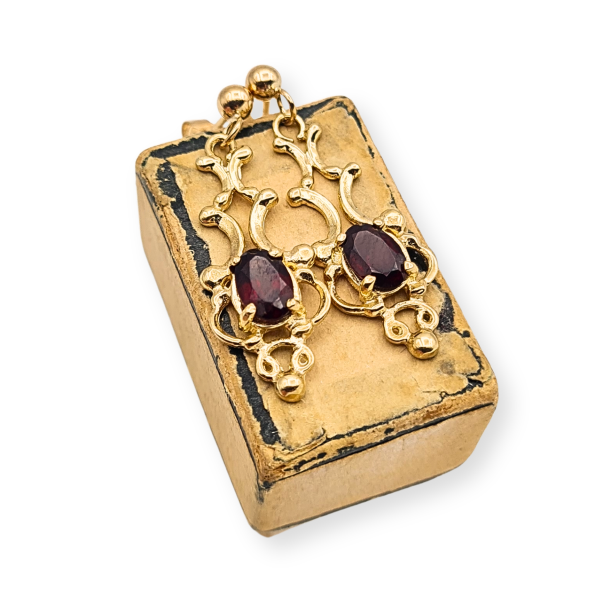 9ct gold garnet drop earrings with ornate openwork filigree design and butterfly backs
