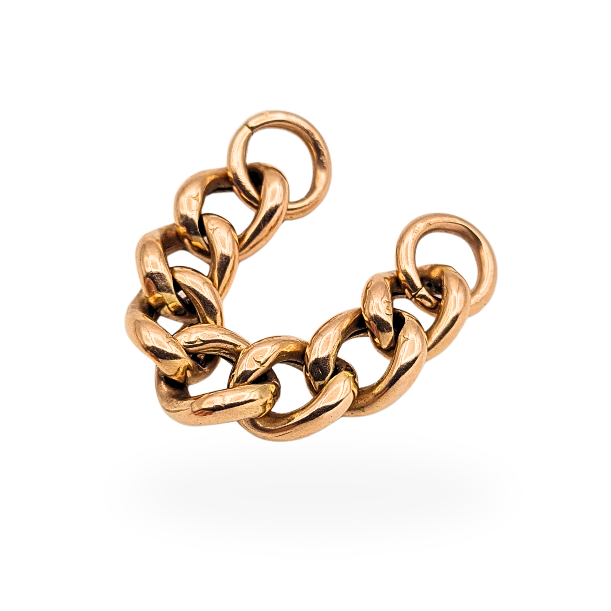 Vintage 9ct rose gold Albert chain extender measuring 2 inches or 5cm long with classic curb links and open jump rings for attaching to a pocket watch chain. Lightweight hollow construction, 7mm wide links, weighing 2.14g, tested as 9ct gold.

