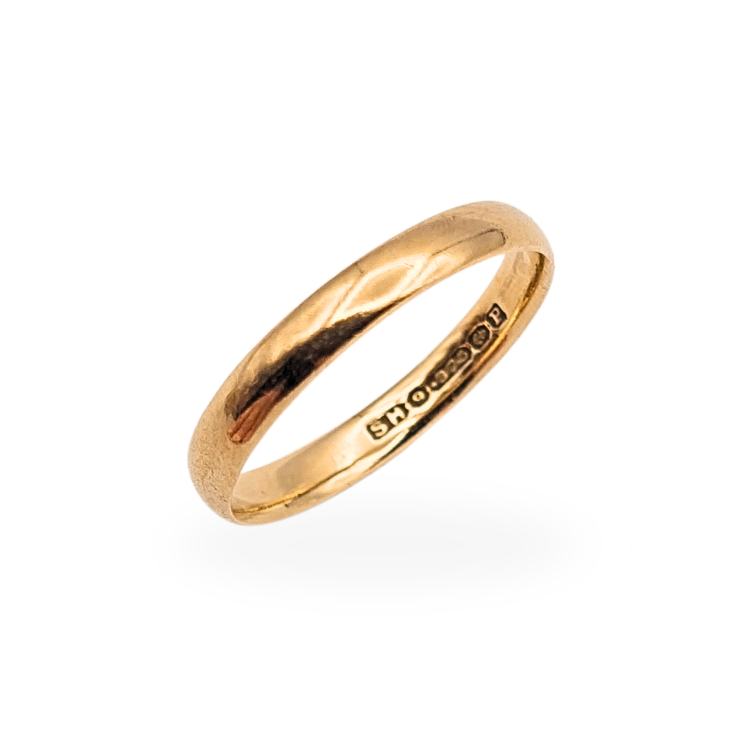 Vintage 9ct gold wedding band with Birmingham hallmark dated 1939, slim court profile ring measuring 2.5mm wide and weighing 1.1g, UK size J 1/2 and US size 5 1/4. A petite antique gold stacking or wedding ring with traditional British hallmarks.
