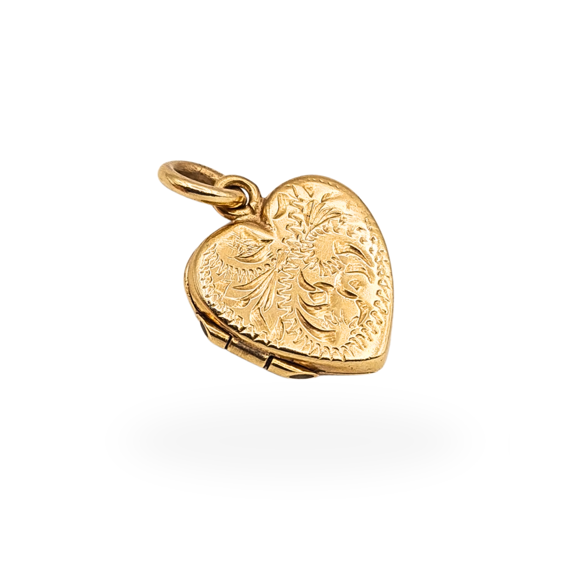 Small 9ct yellow gold engraved heart photo locket pendant with Birmingham hallmark and opening compartment.