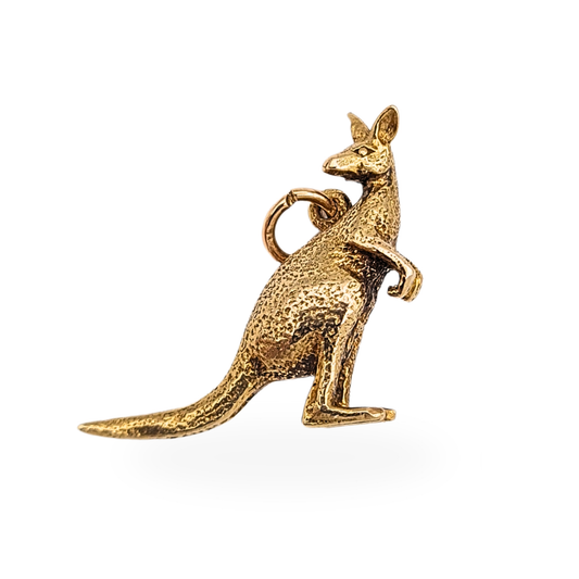 Solid 9ct gold kangaroo charm pendant measuring 19mm tall, 18mm long and 6mm wide, stamped 9ct and fully tested. Detailed textured finish with upright stance and substantial 3.4g weight, ideal as a bracelet charm or small animal pendant.
