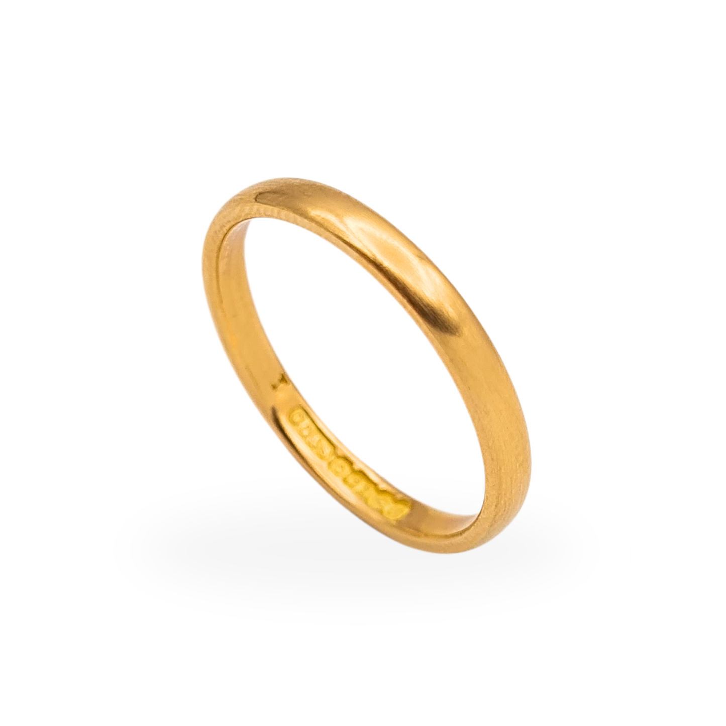 Solid 22ct gold wedding band ring with polished court profile, Birmingham 1975 hallmark, weighing 3.00g.