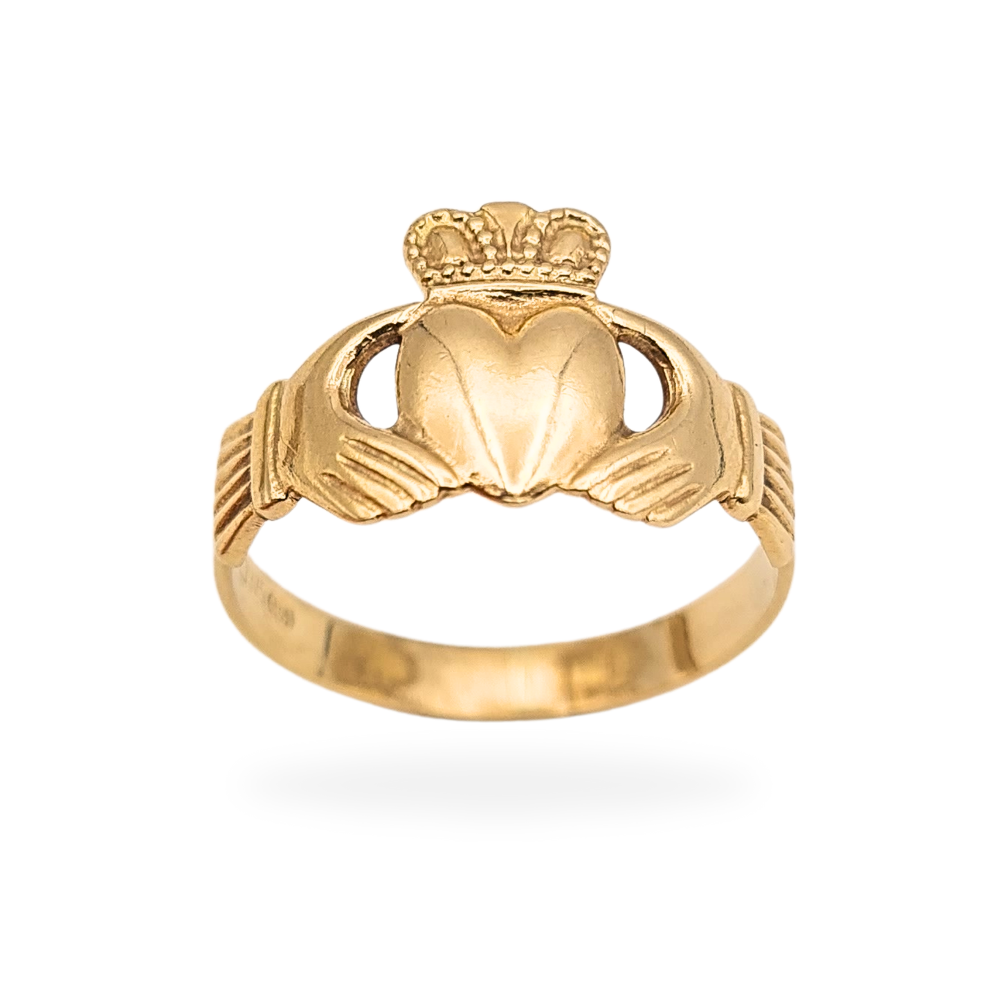 9ct yellow gold Claddagh ring made in Ireland, fully hallmarked 375, featuring a crowned heart held by two hands. Traditional Irish Claddagh design, UK size O / US 7 1/4, 11mm tall front, smooth polished band, vintage condition.
