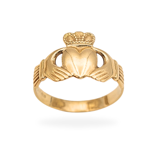 9ct yellow gold Claddagh ring made in Ireland, fully hallmarked 375, featuring a crowned heart held by two hands. Traditional Irish Claddagh design, UK size O / US 7 1/4, 11mm tall front, smooth polished band, vintage condition.
