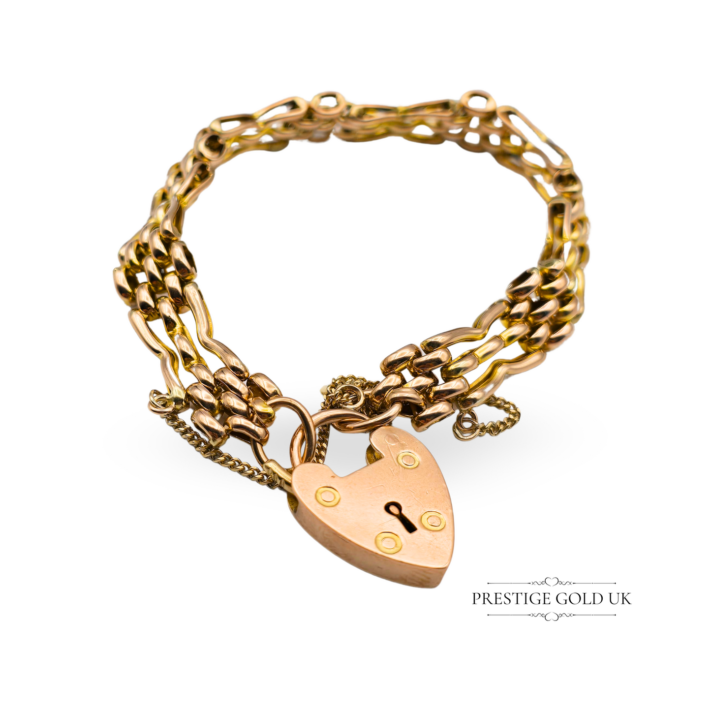Vintage 9ct rose gold bracelet with a 3-bar fancy gate link design, heart padlock clasp, and safety chain, measuring 6.5 inches long by 9mm wide, 11.7g weight.
