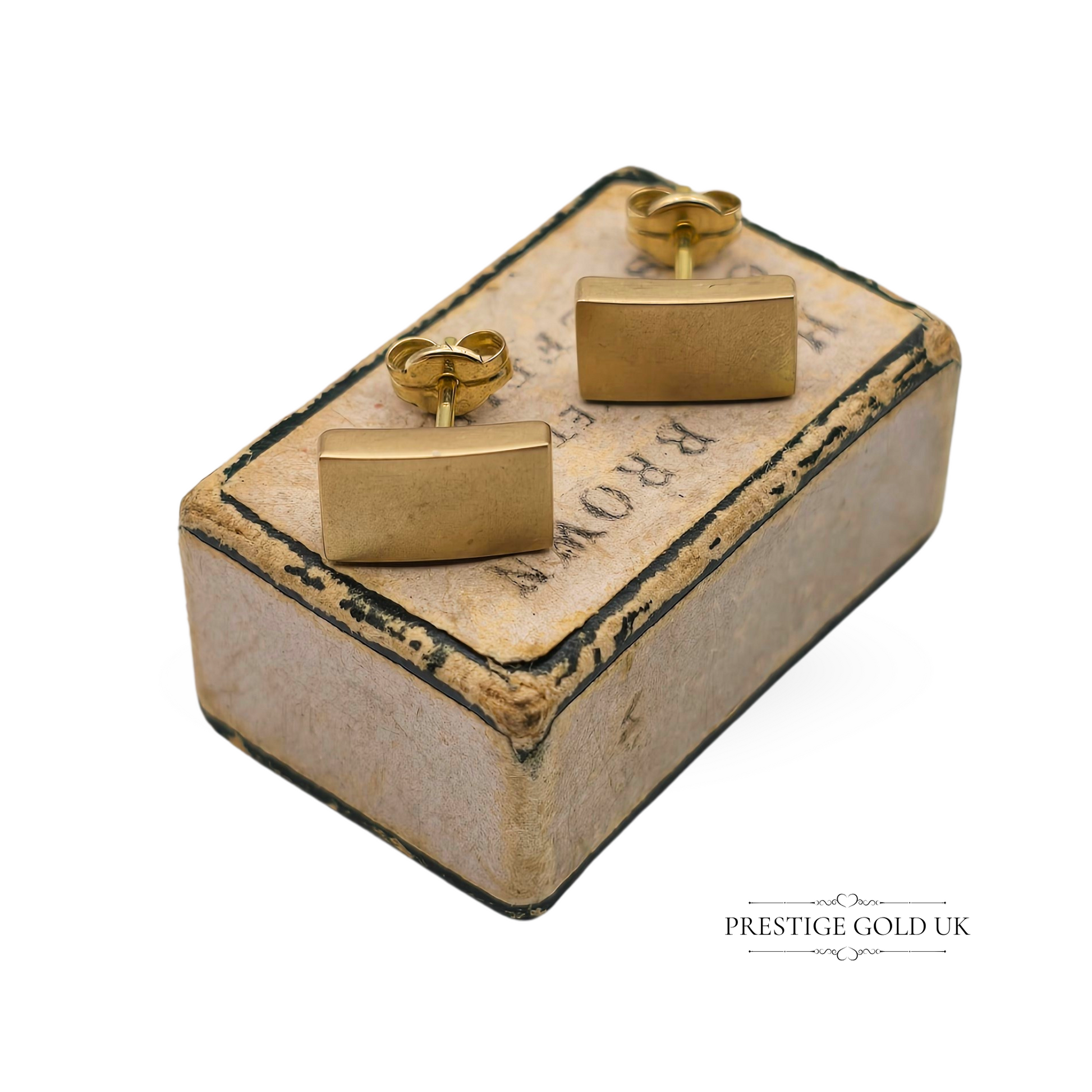 Pair of vintage 9ct yellow gold rectangular stud earrings with a soft satin finish, measuring 9mm by 5mm, stamped 375, featuring a curved rectangular design ideal for everyday wear.