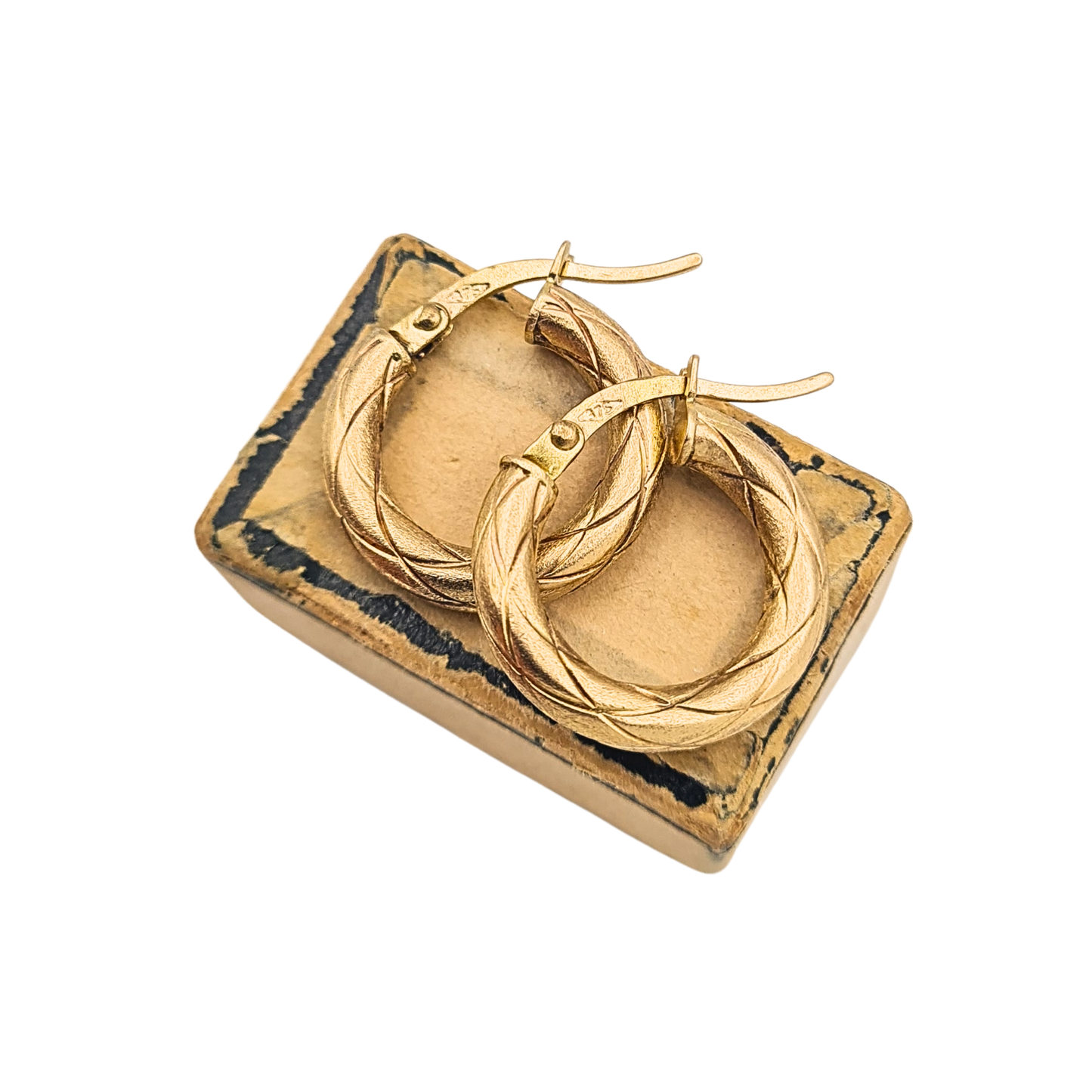 Pair of 9ct gold small hoop earrings with satin finish cross hatch texture and flip top fasteners