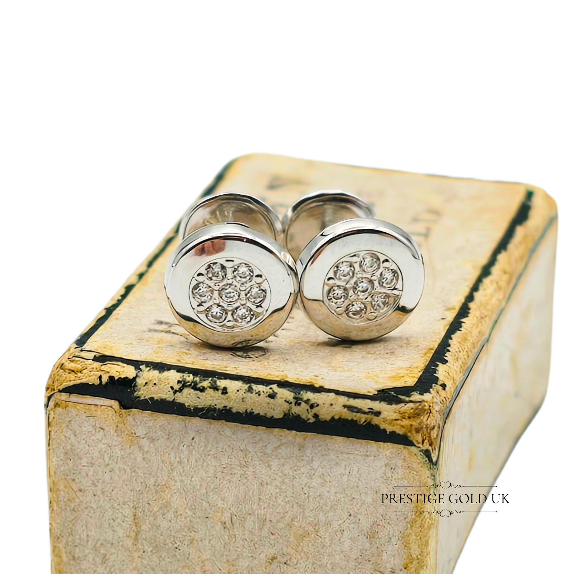 Pair of 14ct white gold stud earrings featuring a round cluster of cubic zirconia stones, 6mm wide with screw back fixings, minimalist and unisex design, tested gold not hallmarked, perfect for daily wear or gifting.