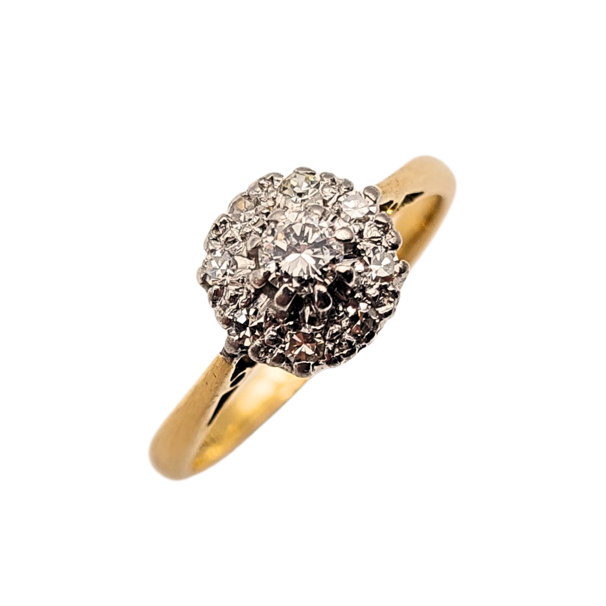 Close-up of a vintage 18ct yellow gold and platinum diamond cluster ring, stamped 18ct and fully tested. Tiny claw-set diamonds form a raised dome cluster on a slim yellow gold band. UK size I 1/2 (US 4 1/2), weighing 2.43g, elegant and refined.