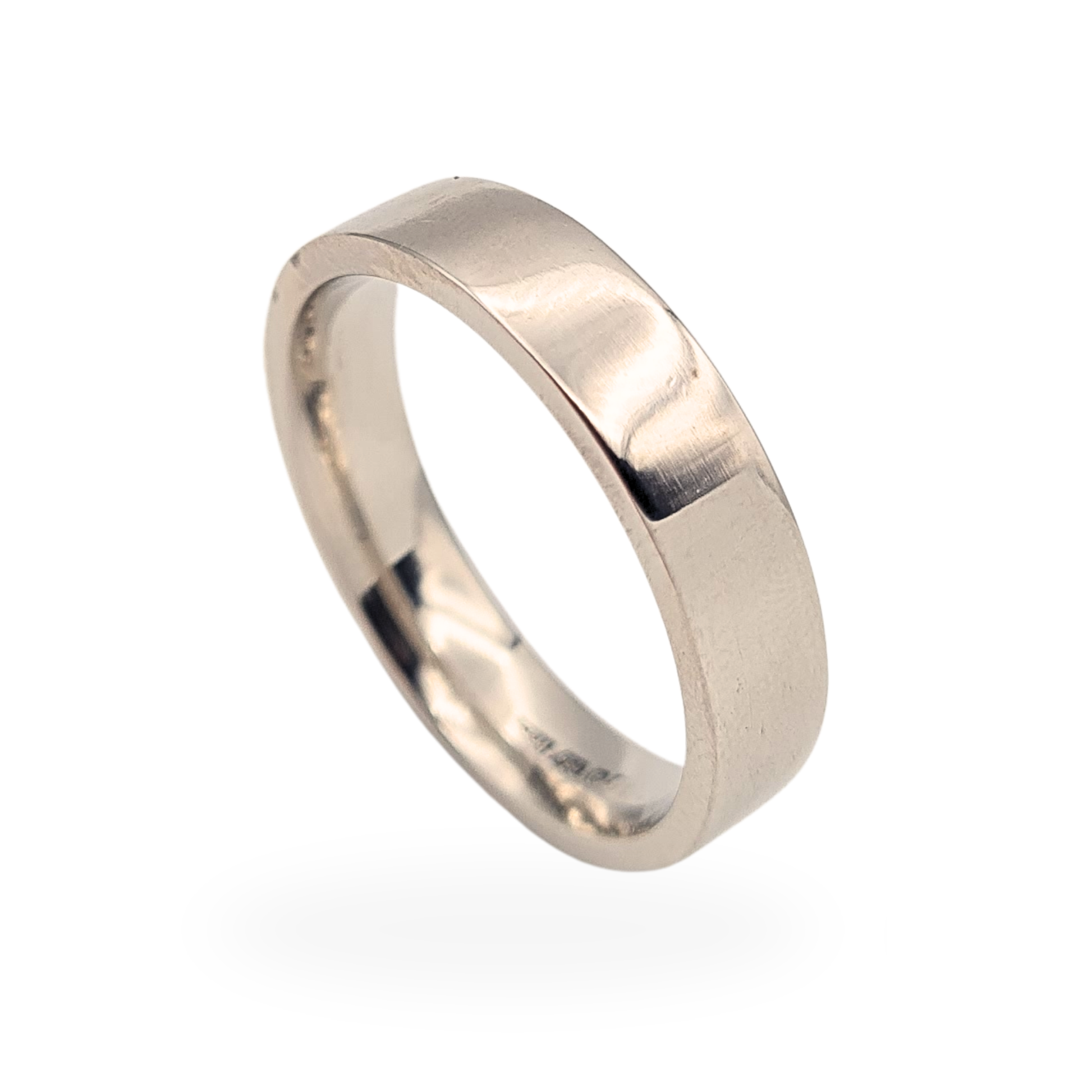 950 palladium wedding band with Birmingham hallmark, wide 5mm flat profile ring with comfort fit interior, UK size W and US size 11 weighing 8.3g. A substantial refurbished palladium wedding ring with clean modern styling and durable high-grade metal.
