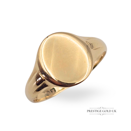 Vintage 9ct yellow gold signet ring with an oval face and inside engraving “A to D 8.4.50”, fully hallmarked for Birmingham 1949, 2.5g weight, UK size R, classic unisex piece.