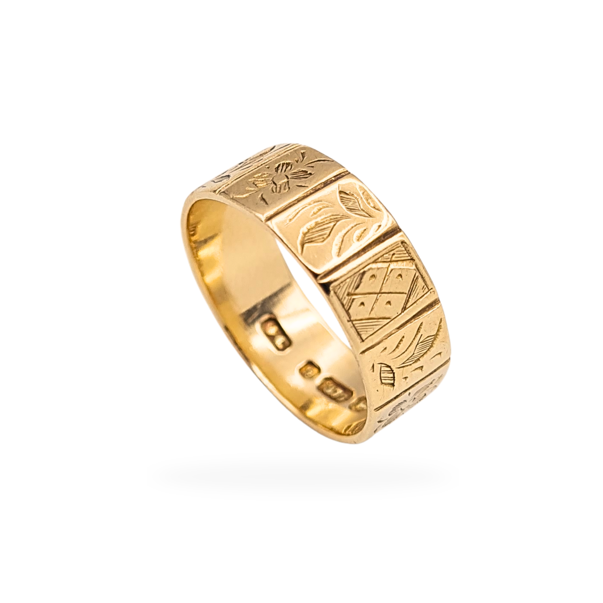 Antique 9ct rose gold ornate panelled floral ring, fully hallmarked Birmingham 1922, UK size P 1/2 (US 7 3/4), 7mm wide and weighing 3.5g. Detailed faceted geometric and floral engraving around the band in warm rose gold, classic British antique design.